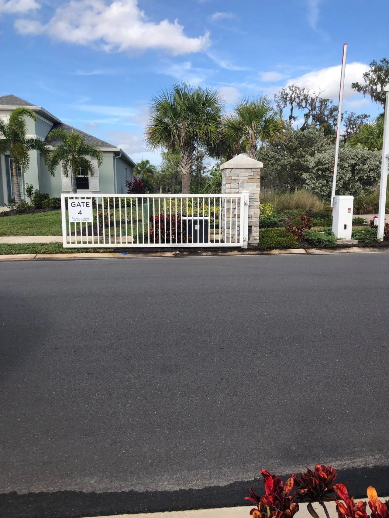 New barrier arm and gate system at the entrance to the Silverleaf neighborhood, managing traffic flow.